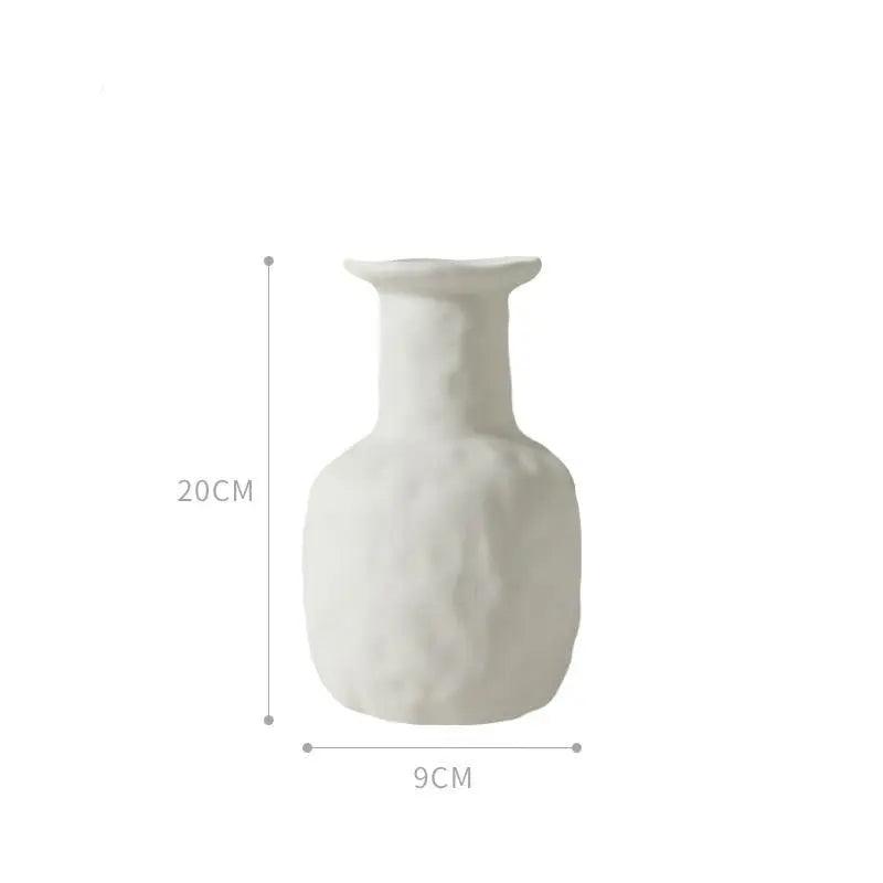 Jarrón de cerámica blanca hecho a mano