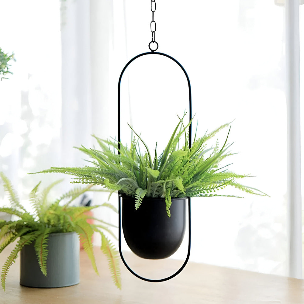 Caelessa - Macetero de pared elegante y estilizado para un interior moderno